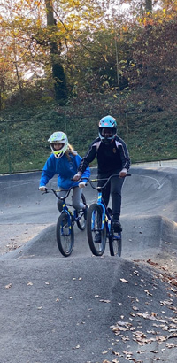 Our Charities – Access to Sports – Our Charities - children on BMX bikes