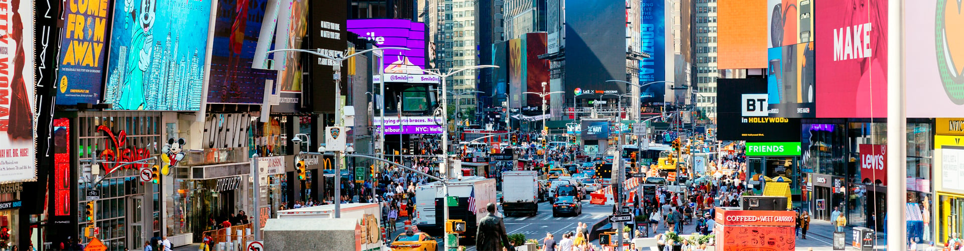 Traffic and advertising signs in Times Square, New York